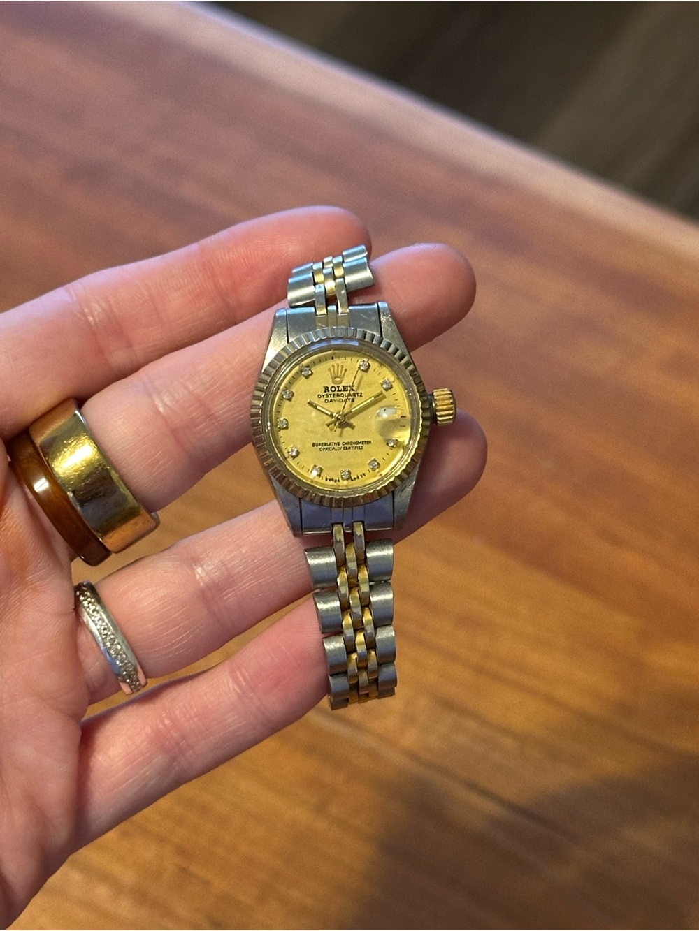 Designer inspired two-tone gold and silver watch with champagne dial